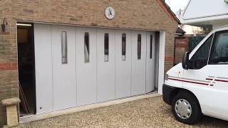 Side Sliding Garage Door with Elongated Windows [upl. by Hsivat]