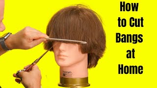 How to Cut Bangs at Home  TheSalonGuy [upl. by Esinek]